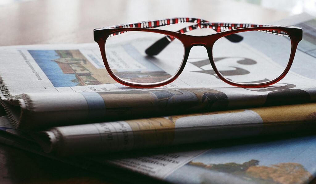 Stacks of documents piled high, representing the overwhelming paperwork in real estate. A transaction coordinator helps reduce inefficiency and errors, keeping everything organized and on track.